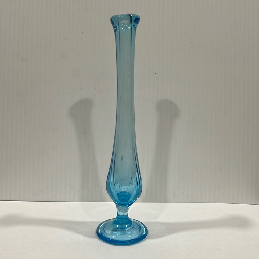 Mid Century Modern Swung Bud Vase in Aqua Blue. Stretched glass. Footed.